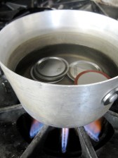Sterilizing the lids to can strawberry jam
