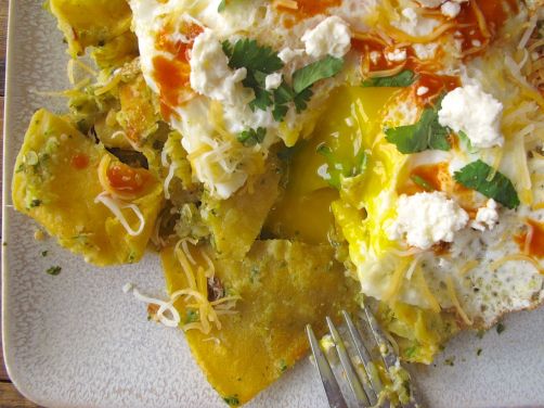 Chilaquiles Verdes with Roasted Tomatillo Salsa, Queso Fresco, and a Fried Egg