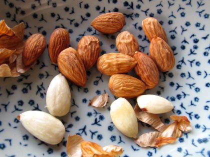 Blanching almonds for Sambal Goreng Telur (Indonesian Egg Curry)