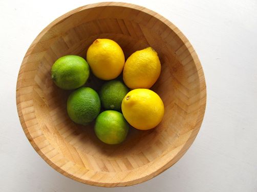 Lemons and limes for Zesty Lemon Lime Bars