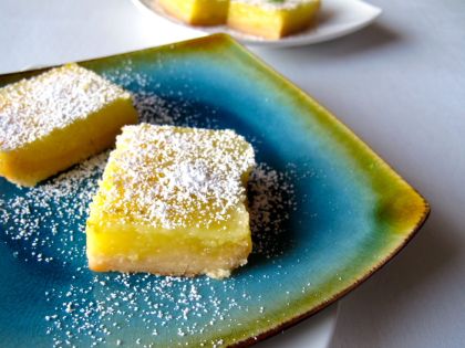 Zesty Lemon Lime Bars with powdered sugar