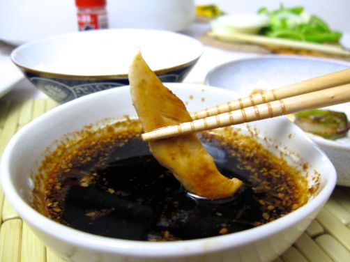 Yaki-tori-niku (Japanese Barbeque Chicken) with a dipping sauce Yaki-tori-niku (Japanese Barbeque Chicken) with a dipping sauce