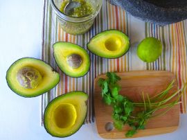 Avocados and cilantro for Roasted Tomatillo Guacamole Avocados and cilantro for Roasted Tomatillo Guacamole