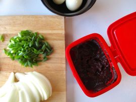 Ingredients for Rabokki: kochujang chili paste, eggs, scallions, onions