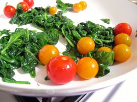 Making Skillet-Baked Eggs with Garlicky Yogurt, Spinach, and Cherry Tomatoes Making Skillet-Baked Eggs with Garlicky Yogurt, Spinach, and Cherry Tomatoes