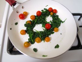 Making Spinach Nests for Skillet-Baked Eggs with Garlicky Yogurt and Cherry Tomatoes Making Spinach Nests for Skillet-Baked Eggs with Garlicky Yogurt and Cherry Tomatoes