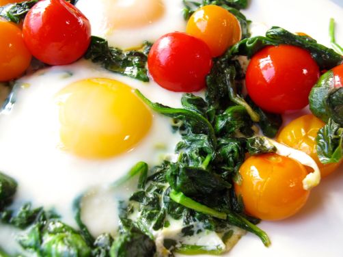 Skillet-Baked Eggs with Garlicky Yogurt and Cherry Tomatoes Skillet-Baked Eggs with Garlicky Yogurt and Cherry Tomatoes
