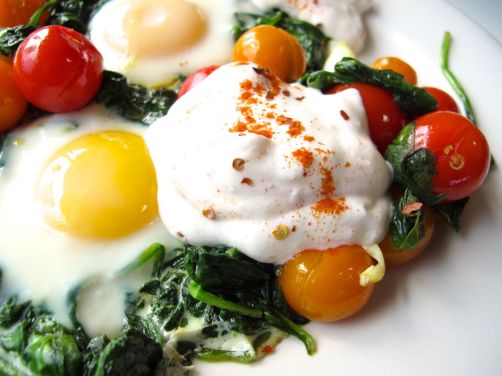 Skillet-Baked Eggs with Garlicky Yogurt, Spinach, and Cherry Tomatoes Skillet-Baked Eggs with Garlicky Yogurt, Spinach, and Cherry Tomatoes