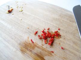 Dicing chili pepper for Nuoc Cham sauce Dicing chili pepper for Nuoc Cham sauce