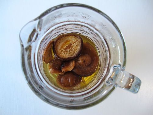 Making Homemade Vegetarian Dashi with kombu seaweed and shiitake mushrooms