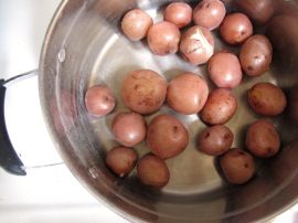 Letting the boiled potatoes dry Letting the boiled potatoes dry