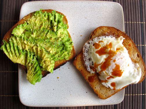 Avocado toast with a fried egg on 50/50 Sandwich Bread