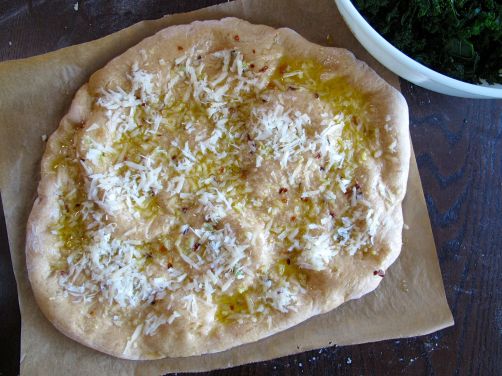 Making Garlicky Kale PIzza with Parmesan and Goat Cheese