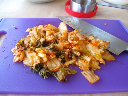 Dicing kimchi for Kimchijeon (kimchi pancake)