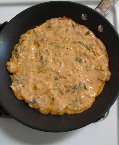 Frying Kimchijeon (kimchi pancake)