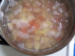 Simmering potatoes in vinegar and water