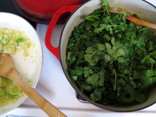 Making Garlicky Green Soup with spinach, kale, cilantro, and scallions
